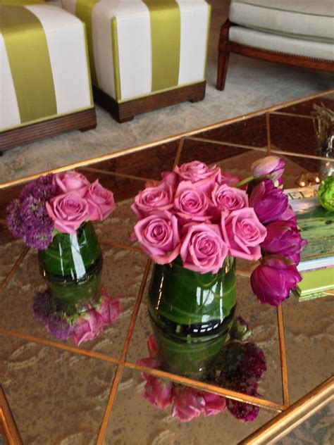 The undercarriage of chairs and tables in a typical interior makes an ugly, confusing, unrestful world. pink roses tulip coffee table arrangement | Coffee table ...