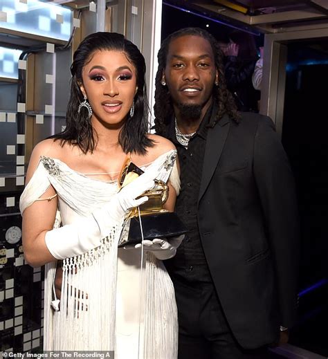 cardi b displays her cleavage in a nude bra as she packs on the pda with on again husband offset