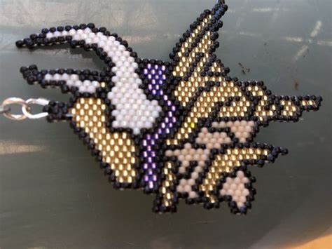 Download many more fun cross stitch patterns for free! Minnesota Vikings Pendant | Beaded earrings patterns, Bead ...