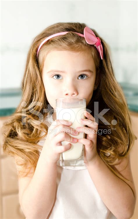 Beautiful Little Girl Drinking Milk Stock Photo Royalty Free Freeimages