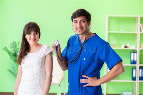 The Female Patient Visiting Male Doctor In Medical Concept Stock Image