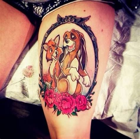 Small fox and the hound tattoo. 35 Totally Magical Disney Tattoos - Neatorama