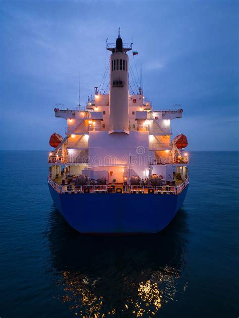 Aerial View Cargo Bulk Carrier Ship On The Sea At Night Stock Image