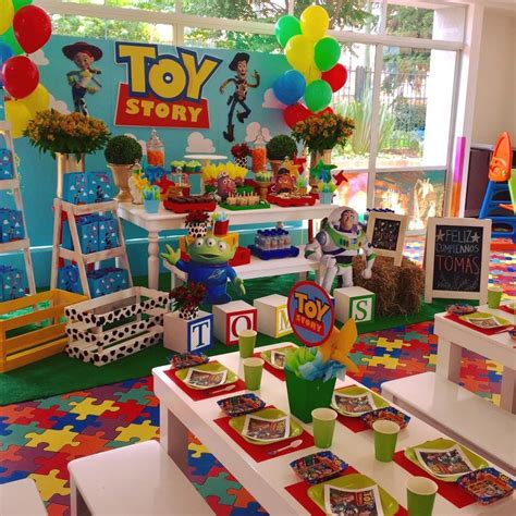 A Toy Story Themed Birthday Party With Balloons And Decorations
