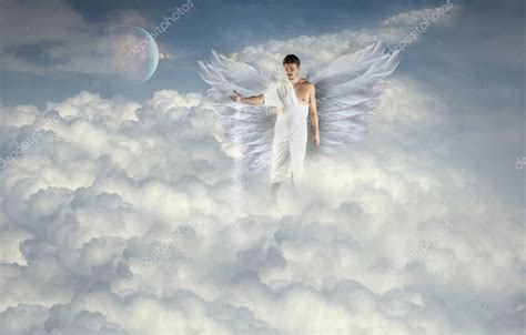 Angel Is Making A Clouds Stock Photo By ©pemaphoto 58199347