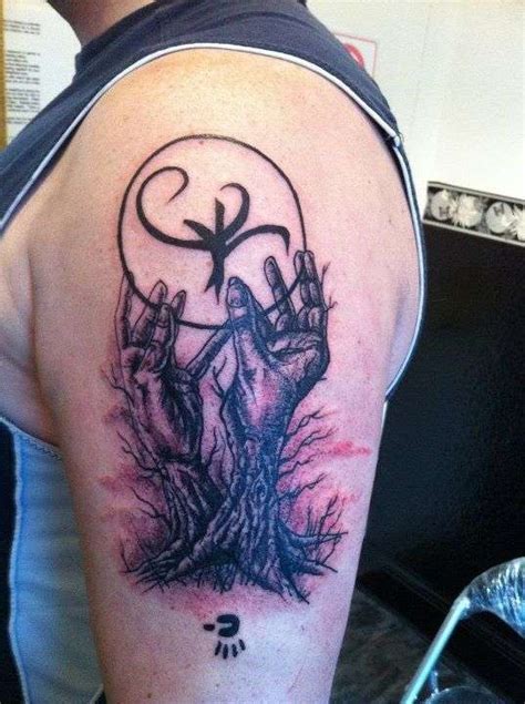 Tree And Hands Tattoo