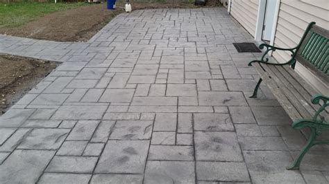 Stamped concrete, often called textured or imprinted concrete, replicates stones, such as slate and flagstone, tile, brick and even wood. How Does Stamped Concrete Work | MyCoffeepot.Org