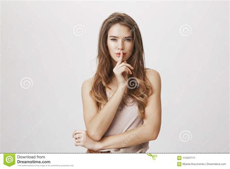 Woman Ready To Tell Secret Of Beauty Portrait Of Charming Flirty Caucasian Female Making Shush