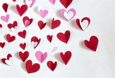 Premium Photo Red White And Pink Paper Hearts Cut Out Of Paper For