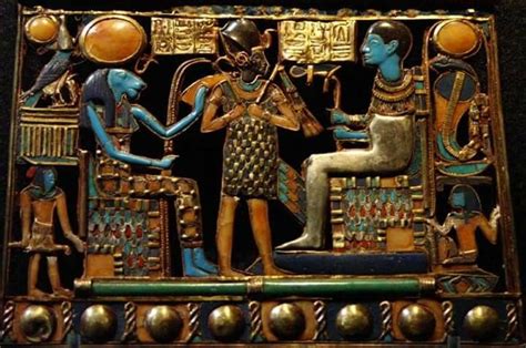 A Pectoral From The 18th Dynasty Tomb Of Tutankhamun Showing The King