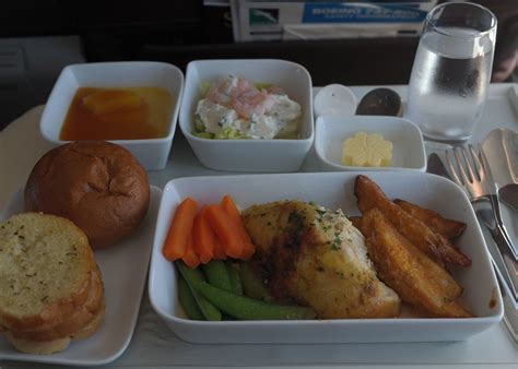 Shortly after takeoff, breakfast was served, and. Flying SilkAir Business Class- Phuket to Singapore ...