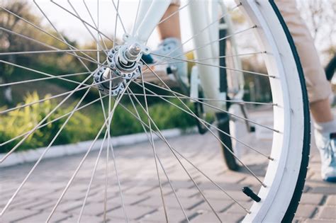 Premium Photo Closeup Of Bike Wheel With Chrome Spokes