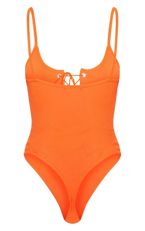 Orange Rib Lace Up Sleeveless Bodysuit Tops Prettylittlething