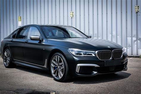 Get it as soon as tue,. BMW M760Li looks stunning in Frozen Black
