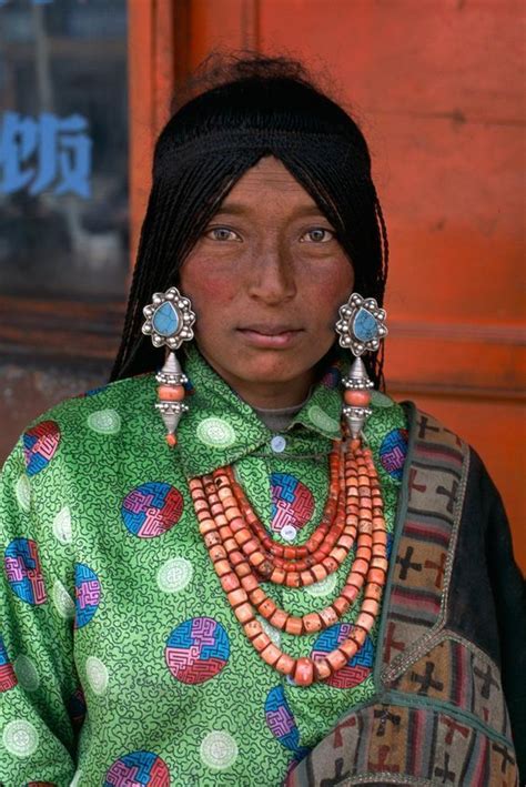 Portrait Of A Tibetan Woman Wearing Traditional Jewelry