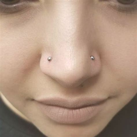 Double Nostril Piercings By Nikey Emerald Tattoo Lodi Lodi Ca Double Nostril Piercing Face