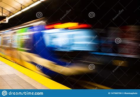 Colorful Abstract With Motion Blur Of Subway Train Exiting Station