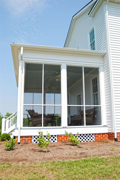 This Is A Shot Of The Side View Of The Enclosed Back Porch Of A Home We
