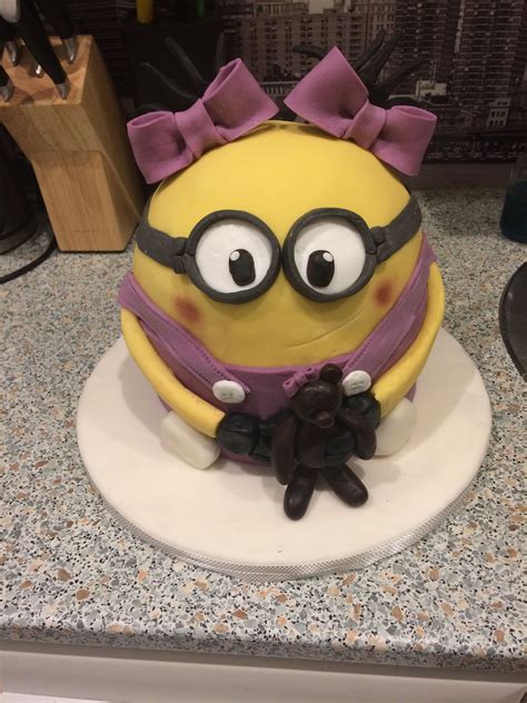 · chocolate layer cake with chocolate buttercream frosting, surrounded by kit kat candy bars, then topped with m&m's and tied with a big bow for a. Pin by Gabika Sabolova on my cake | Minions, Character ...