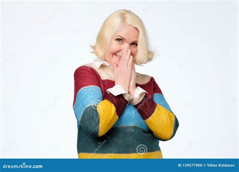 Shy Senior Woman Feeling Shy After Hearing A Compliment Posing In