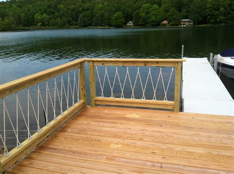 Rope deck railings are tied with decorative nautical netting. Nautical Rope Deck Railing • Decks Ideas