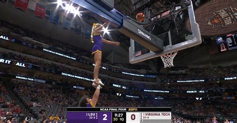 Lsu Cheerleader Retrieves Ball Stuck On Top Of Basket