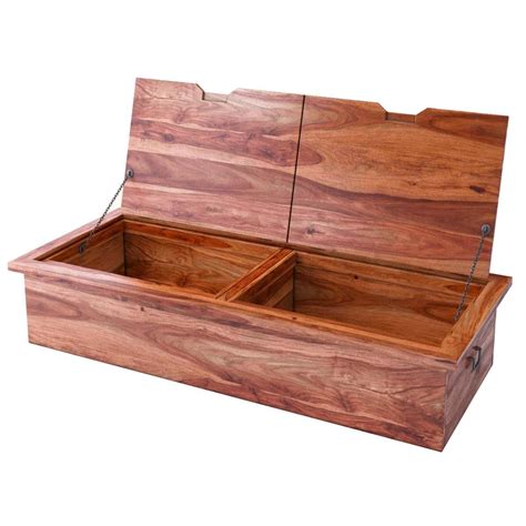 Adder wood dark stained trunk bound with iron strapping secured with brass studs. Delaware Solid Wood Coffee Table Storage Trunk