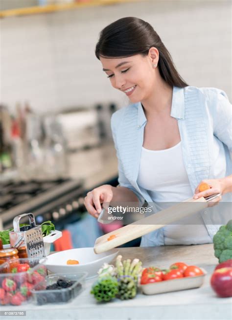 Woman Cooking Dinner At Home High Res Stock Photo Getty Images
