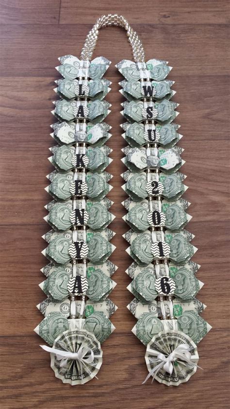 Best 25+ Money lei ideas on Pinterest | Candy graduation leis, Diy money lei and Diy candy leis ...