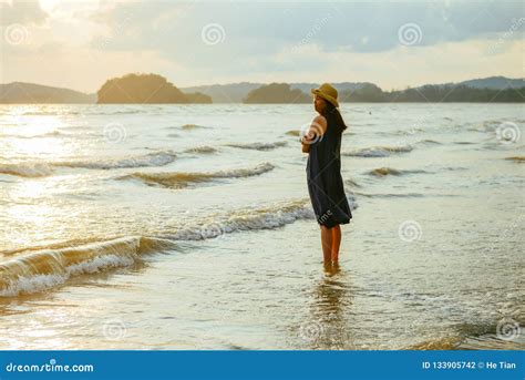 Single Young Woman Standing On Beach When Sunset Stock Photo Image Of
