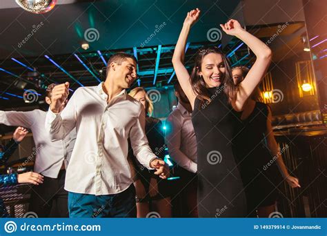 Happy People Are Dancing In Club Nightlife And Disco Concept Stock