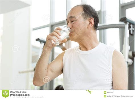 Asian Senior Man Drinking Water At A Gym Stock Image Image Of