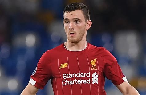 Andy robertson leaves the field with the help of medical staff. Andy Robertson criticises Atletico players for 'falling over'
