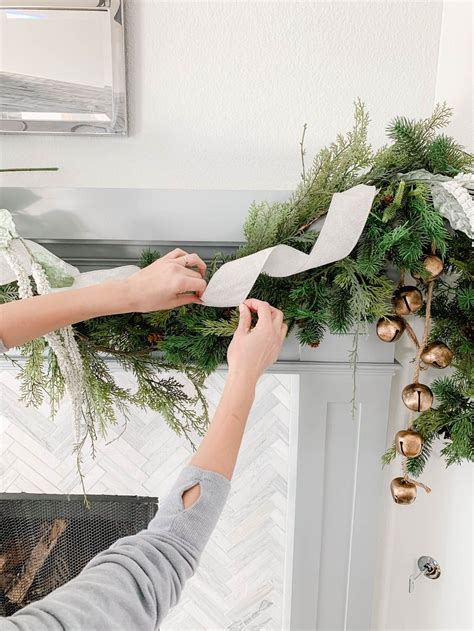 Homemade christmas decorations for the table. How to Hang A Holiday Garland Without Damaging Your Walls or Mantle | Holiday garlands ...