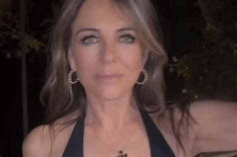 Fans Sweat As Elizabeth Hurley Struts In A Plunging Jumpsuit Without A Bra