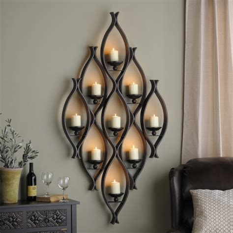 Although the traditional sconce brings an image of torches and candles, wall sconces provide a unique fixture for modern decoration that can be applied differently throughout the home. Large Wall Sconces Candles Large Metal Wall Sconces Candle Holders - Oregonuforeview