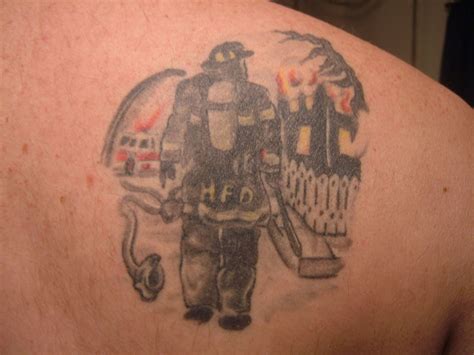 10968 more angel and demon fighting tattoo designs tattoo design. Cool Firefighter Tattoos Design | Fire fighter tattoos ...