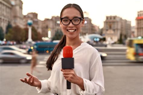 24 Hour News Source Tv Reporter Presenting The News Outdoors