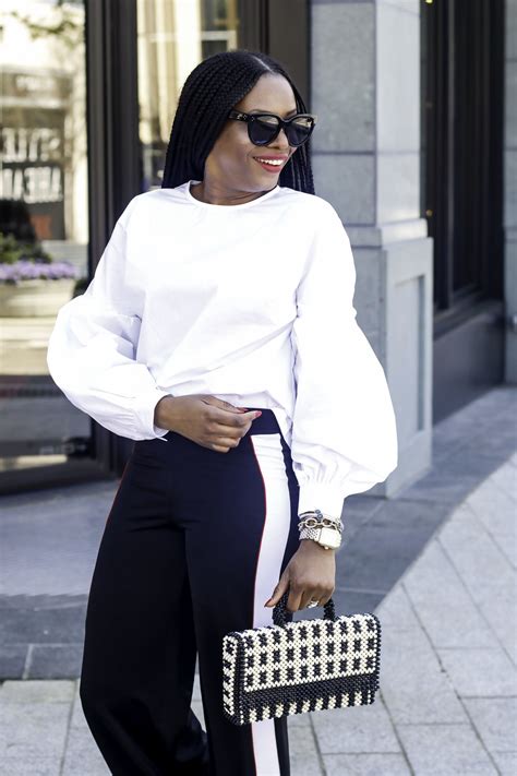 Feeling great respect, sometimes mixed with fear or surprise: SPORTY SLEEK - Awed by Monica