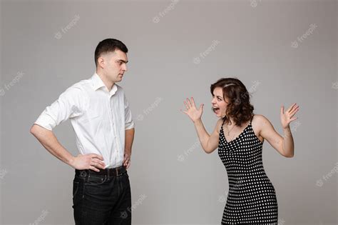Premium Photo Angry Couple In Love Stands And Screams To Each Other