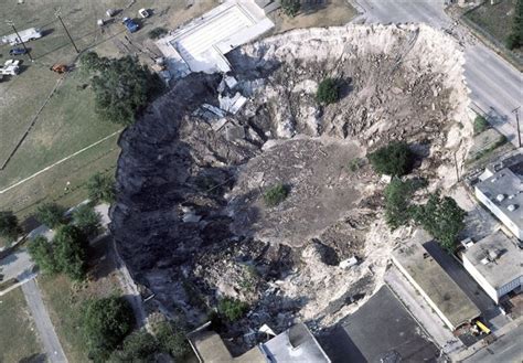 Giant Sinkholes And Road Collapses 23 Pics