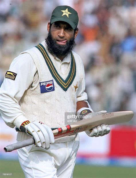 Pakistani Batsman Mohammad Yousuf Walks Back To The Pavilion After He