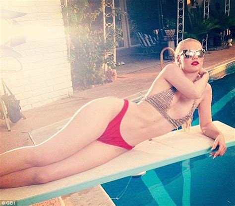 Iggy Azalea Shows Off Her Hourglass Figure In A Metallic Bikini Days