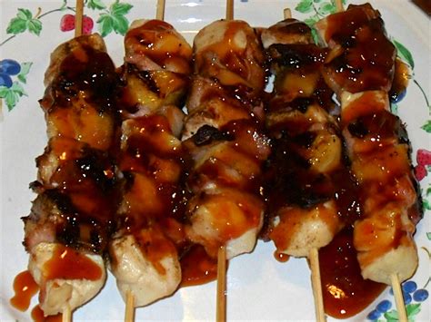Wrap each piece of chicken with 1/2 a slice of bacon. chicken_bacon_pineapple_kabobs04 - Cast Iron and Wine