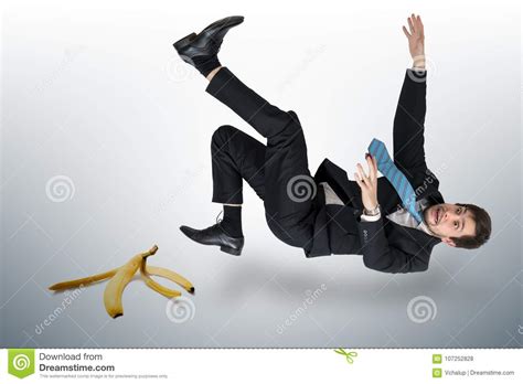 Businessman Slipping On A Banana Peel Stock Photo Image Of Skin