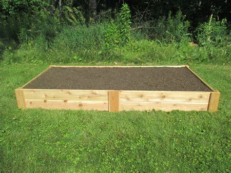 I did this because it reduces the number of cuts needed (i'm using 8 feet long boards). 4X8 CEDAR GARDEN RAISED BED