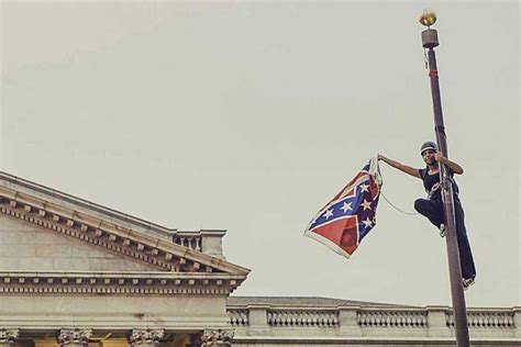 Activist Takes Down Confederate Flag Outside South Carolina Capitol