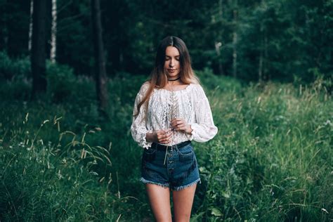 wallpaper model women outdoors forest portrait necklace white tops jean shorts grass