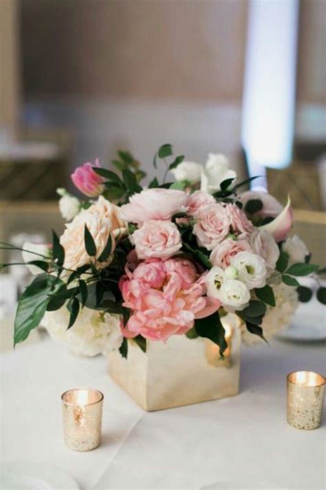 blush pink and white low and lush wedding centerpiece in gold square vase mecrury glass