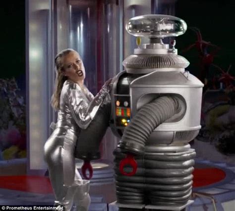 Kendra Wilkinson Squeezes Into Skintight Silver Spacesuit In Lost In Space Music Video Daily
